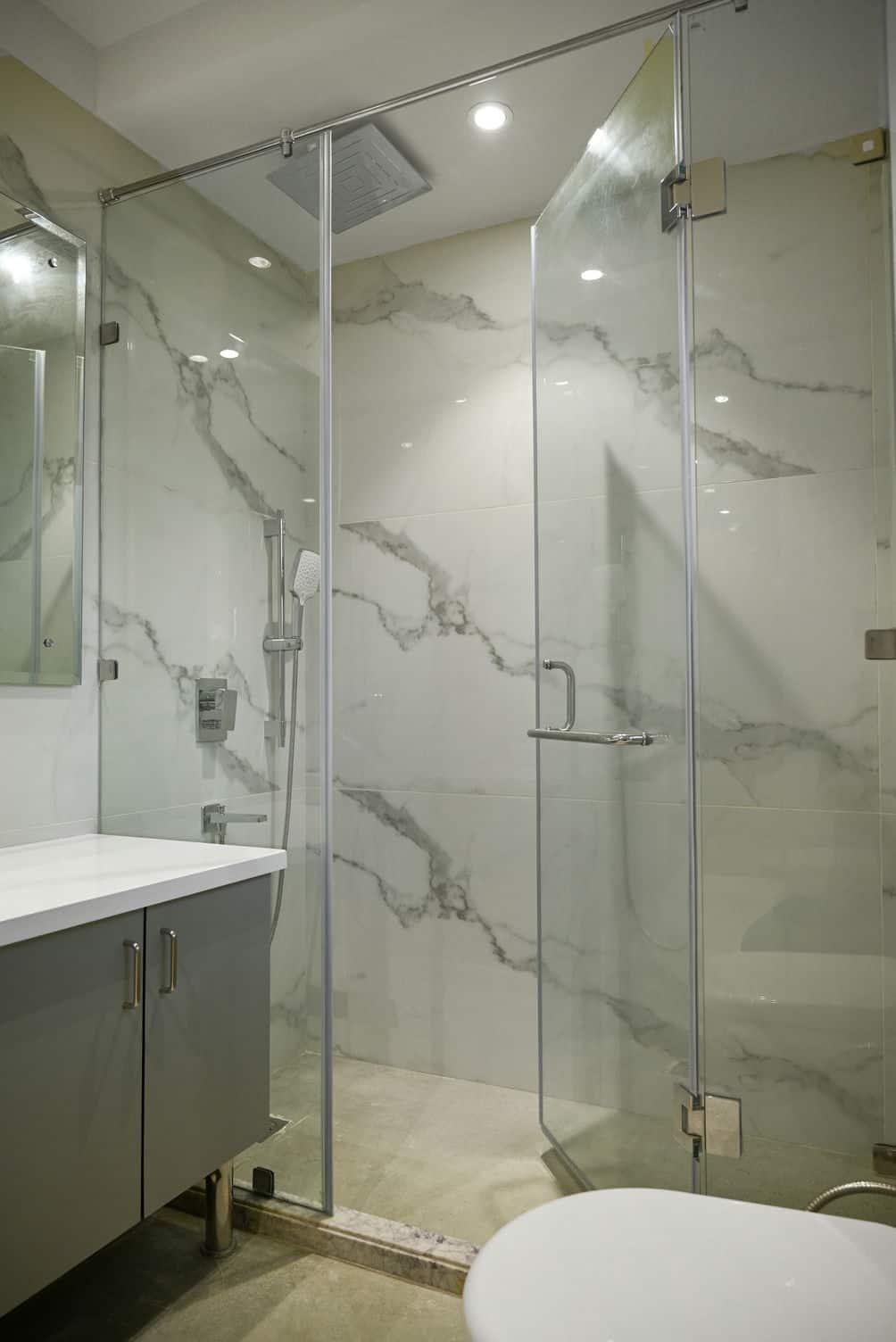 B-21 Geetanjali Enclave bathroom with glass shower cubicle