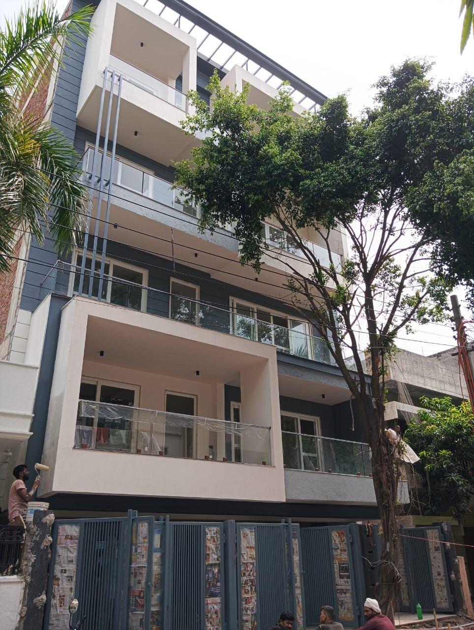 D-267 Sarvodaya Enclave street view at sunset