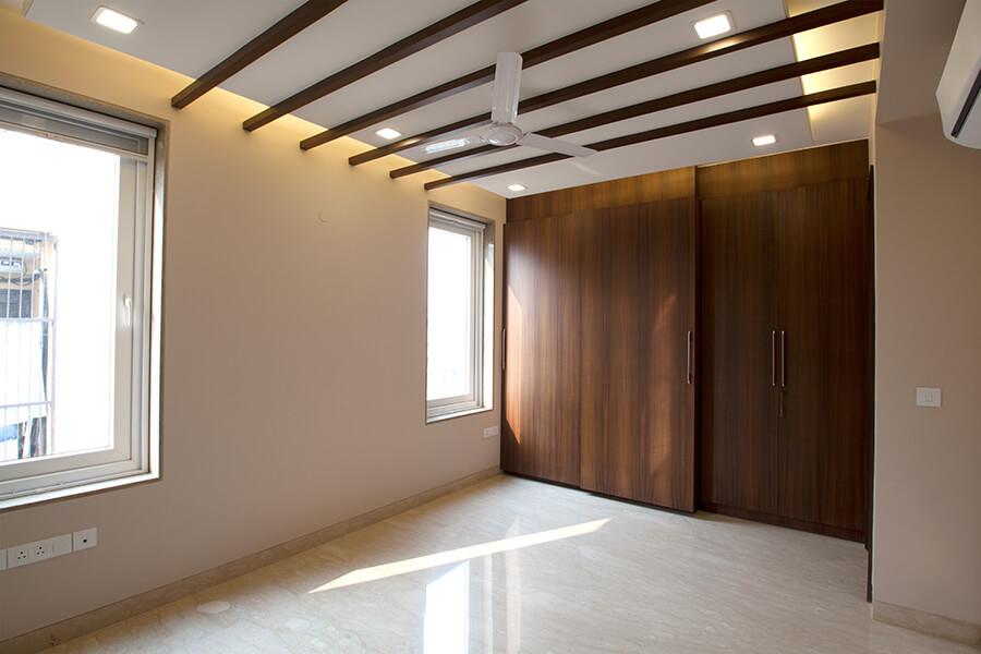 H13 Green Park Main bedroom with wooden wardrobe wall