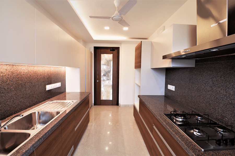 Panchsheel Enclave modular kitchen with granite countertops