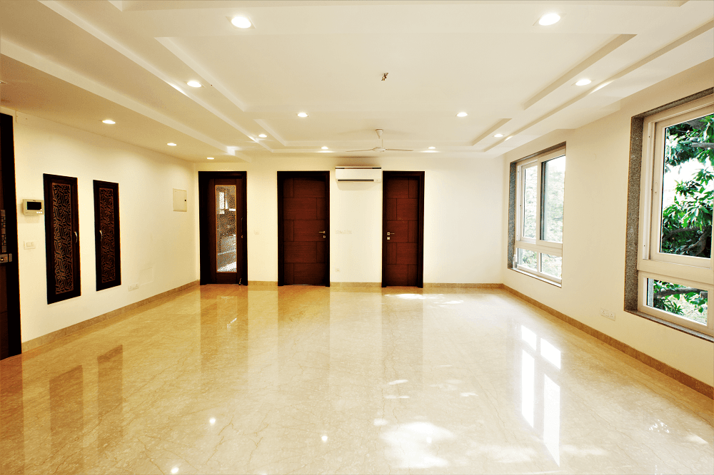 Panchsheel Enclave living and dining area in Italian marble