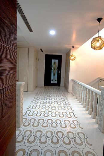 S-353 Panchsheel Park foyer with patterned marble flooring