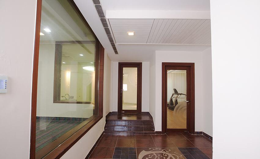 S-353 Panchsheel Park gym and steam room corridor